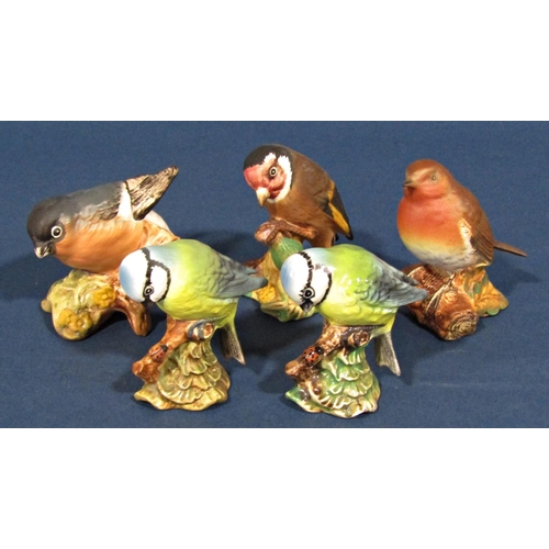 1110 - A collection of four Royal Doulton Bunnykins figures, five Beswick British birds, Beatrix Potter Jem... 