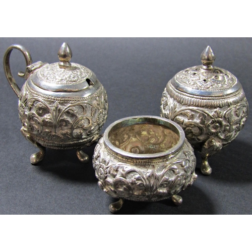 1227 - A three piece Cambodian silver condiment set stamped T. 90, ornately engraved and six Japanese sterl... 