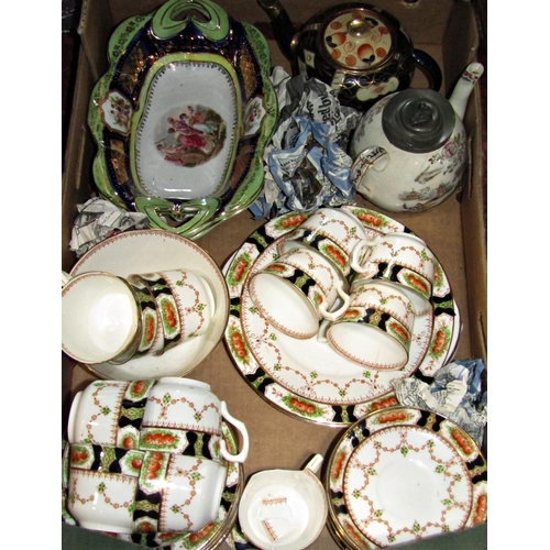 1135 - Four boxes of miscellaneous china to include Devon ware vase, figures, Imari vase, decorative plates... 