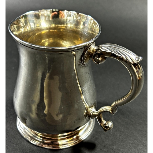 1223 - A George II silver baluster shaped tankard with scrolled handle, monogrammed London 1757, maker Thom... 