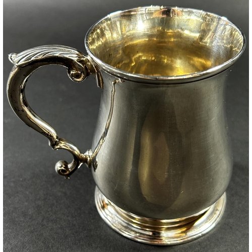 1223 - A George II silver baluster shaped tankard with scrolled handle, monogrammed London 1757, maker Thom... 