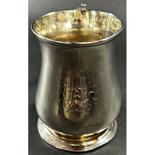 1223 - A George II silver baluster shaped tankard with scrolled handle, monogrammed London 1757, maker Thom... 