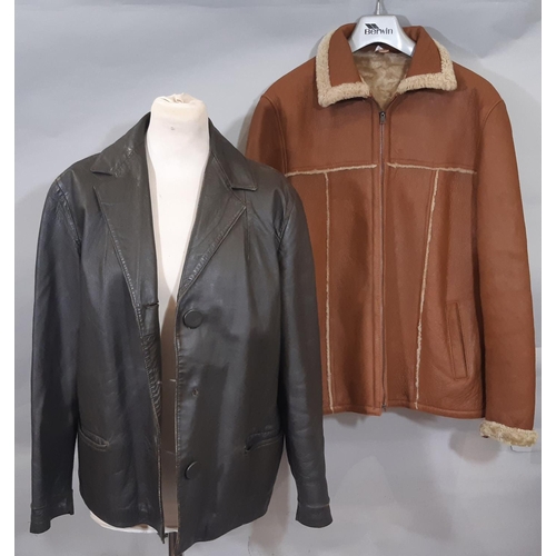 1572 - Two vintage leather ladies jackets comprising a tan coloured leather jacket with fleece lining size ... 