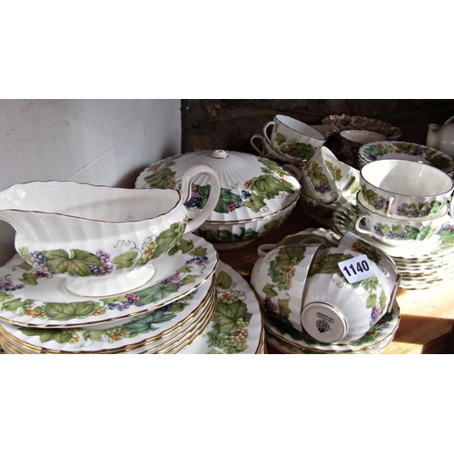 1140 - A collection of Worcester Vine Harvest pattern table ware including dinner plates, side plates, soup... 