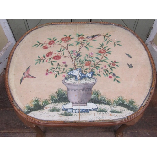 2171 - A stripped pine occasional table of oval form raised on four pad feet, the plate glass top enclosing... 