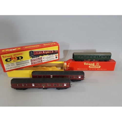 332 - Boxful of 00 gauge model railway coaches and rolling stock etc; green and maroon coaches are by Tria... 