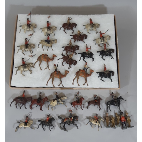 341 - Collection of Britains hollow lead painted figures including mounted soldiers, lancers, and guards, ... 