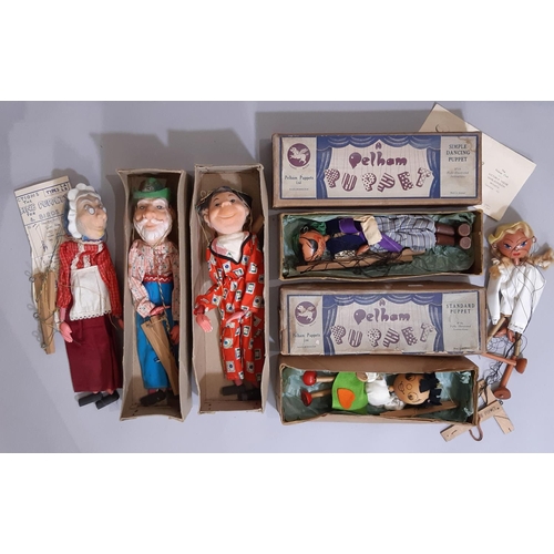 342 - Collection of vintage puppets comprising a boxed Pelham Pirate , boxed Pelham girl with larger head ... 