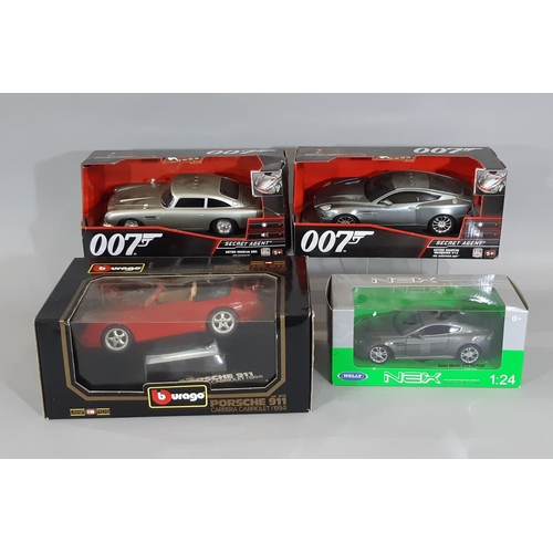 343 - Four boxed model cars including Burago Porsche 911 1994, two 007 Secret Agent Aston Martin from Die ... 