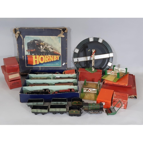 344 - A collection of Hornby O gauge clockwork railway locomotives, wagons and track including boxed Tank ... 