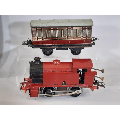 344 - A collection of Hornby O gauge clockwork railway locomotives, wagons and track including boxed Tank ... 