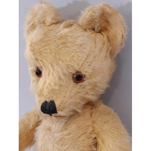 347 - Vintage teddy bear, mid 20th century, with long golden plush, large ears, pronounced muzzle, glass e... 