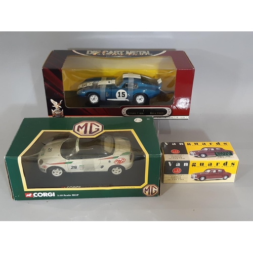 348 - 2 boxed die-cast models of sports cars, both 1:18 scale and not removed from boxes, comprising 1965 ... 