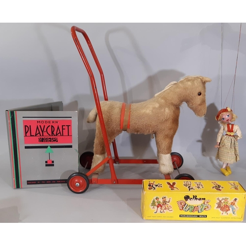 352 - Vintage toys; a ride on children's horse toy by Chiltern Toys, a boxed Pelham Puppet 'Tyrolean Girl'... 