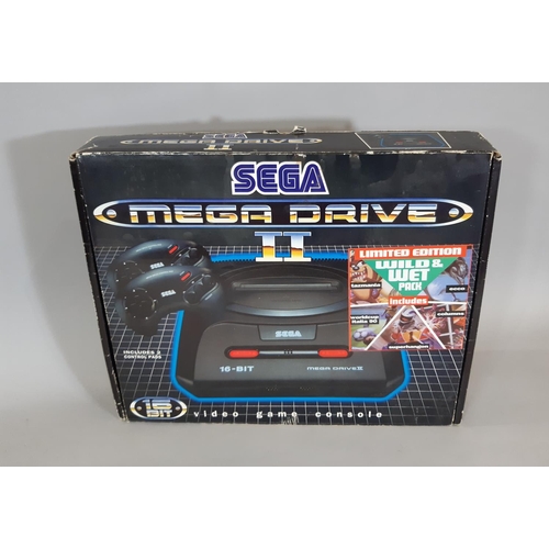 354 - Boxed Sega Mega Drive II (untested) with Taz-Mania and Ecco the dolphin games