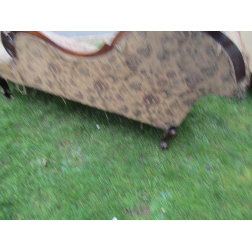 2318 - A Victorian chaise longue with good quality mahogany show wood frame with scrolling foliate detail a... 