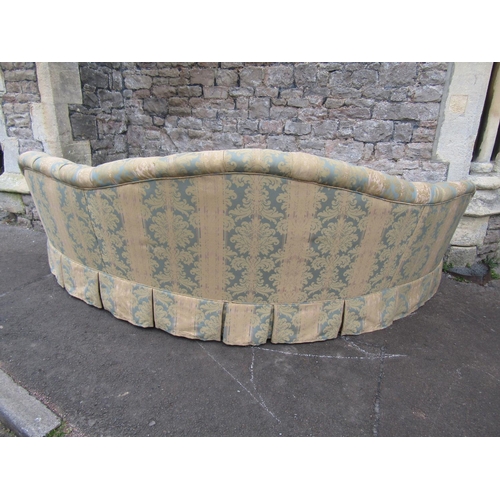 2320 - A good quality Victorian style sofa of curved form with buttoned repeating floral patterned upholste... 