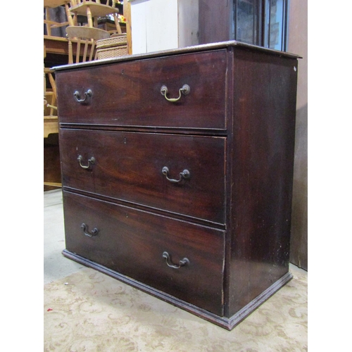 2220 - A Georgian mahogany bedroom chest, fitted with three deep drawers with brass swan neck handles, 116c... 