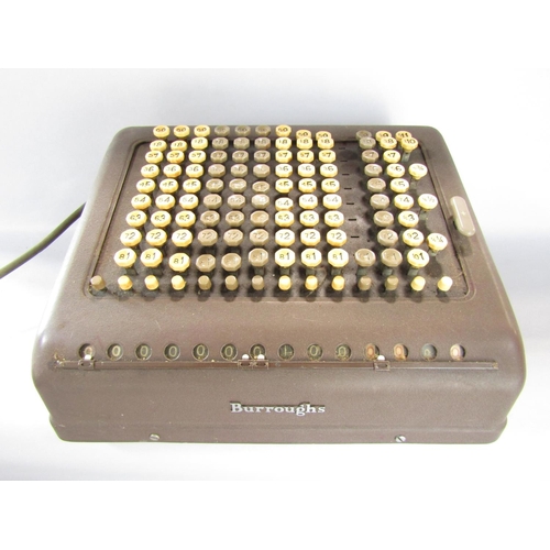 1500 - A Burroughs Electronic Calculator with a distressed original bag.