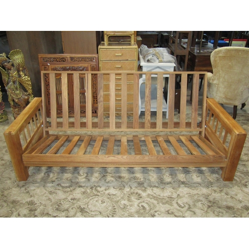 2325 - A Futon Co Vienna solid oak framed double sofa bed, with slatted framework, 207cm wide