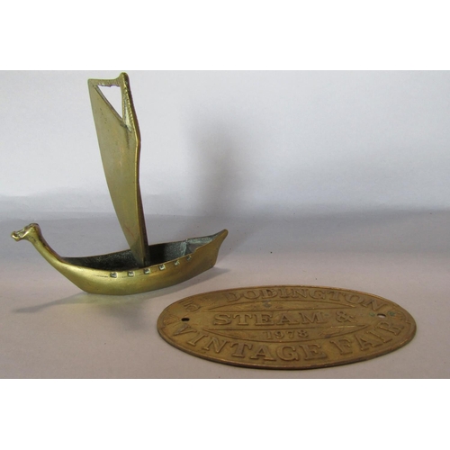 1426 - A boat’s brass propeller 39cm diam approx, a small brass plaque “Dodington Steam & Vintage Fair” and... 