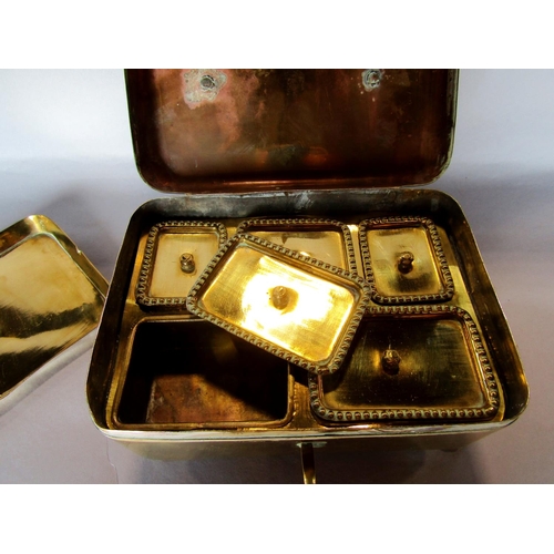 1427 - An early 19th century brass travelling spice box with mixing tray and lockable clasp, bearing a Trad... 