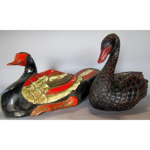 1433 - A wooden polychrome painted duck doorstop/ornament, and a similar resin swan.