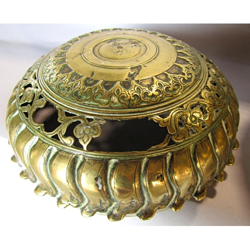 1435 - An Indian brass spherical incense burner with all over deep engraved decoration and piercings to the... 