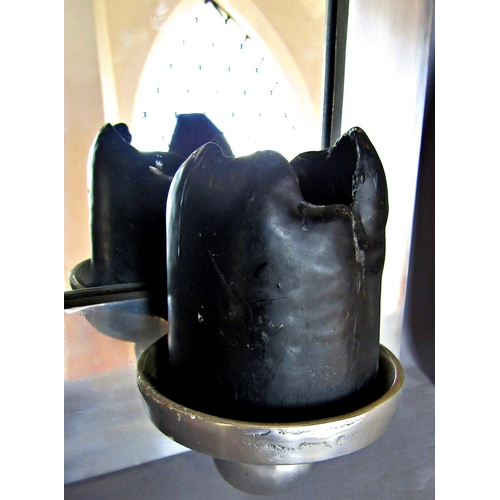 1439 - A pair of steel Gothic arched wall sconce with mirrored back and single candle stand. 50cm x 23.5cm.