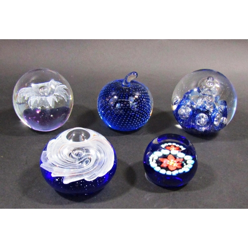 1151 - Twenty three various glass paperweights with Caithness, Whitefriars, examples with millefiori and fl... 