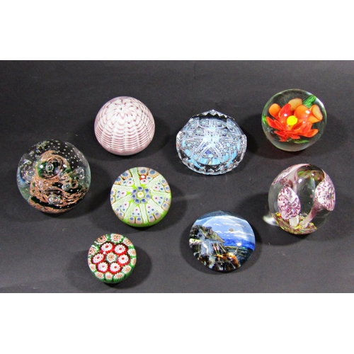 1151 - Twenty three various glass paperweights with Caithness, Whitefriars, examples with millefiori and fl... 