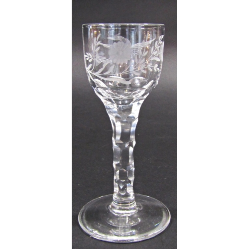 1154 - Three 19th century floral and bird engraved, cut glass wine glasses on faceted stems 14.5cm tall.