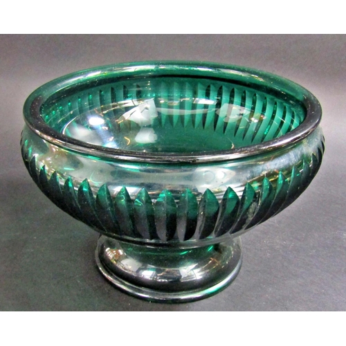 1174 - A Waterford Glass clock, 10cm wide, a heavy green cut glass fruit bowl with ribbed sides, three glas... 