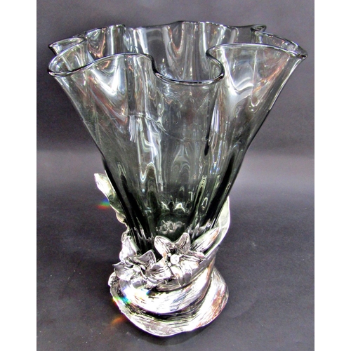 1175 - A large smoked glass handkerchief fold vase set in a silvered floral base, 40cm tall.