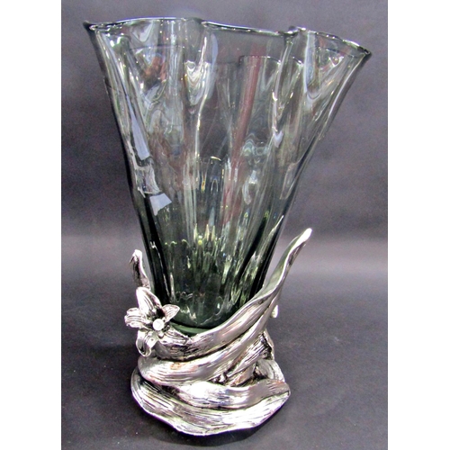 1175 - A large smoked glass handkerchief fold vase set in a silvered floral base, 40cm tall.