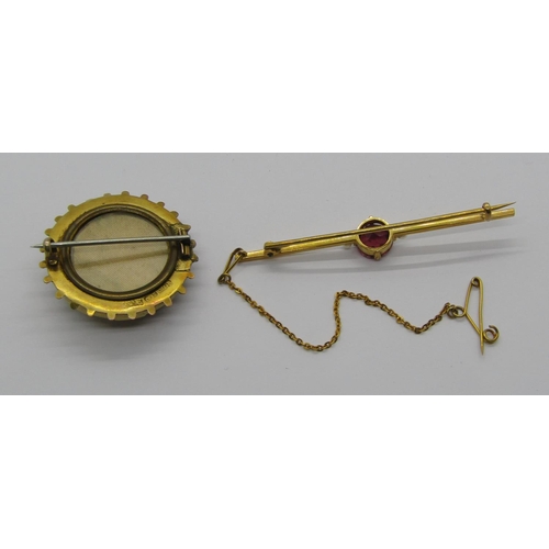 1257 - Edwardian yellow metal bar brooch set with garnet and seed pearls, 3.1g, together with a further lat... 