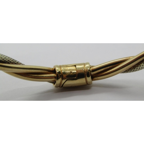 1267 - 9ct bi-colour hinged bangle of rope twist design, maker 'B&N', 13.9g