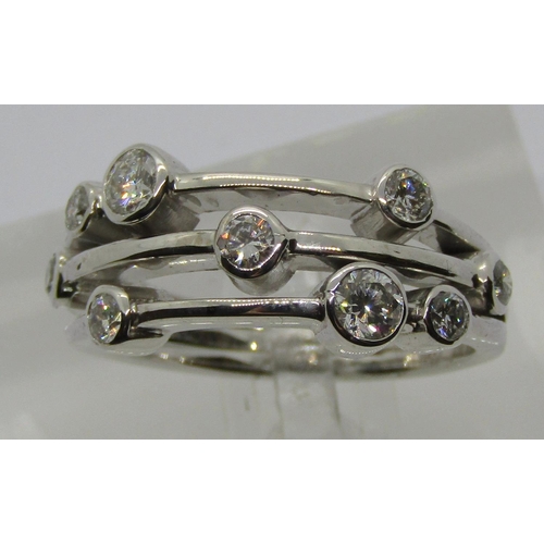 1282 - White metal diamond bubble ring, possibly by Boodles in the 'Radiance' style, largest pair of diamon... 