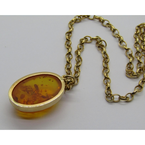 1284 - Vintage 9ct amber pendant necklace, the oval cabochon amber 2.5 x 1.8cm approx, 14.3g