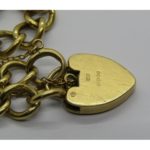 1287 - 18ct curb link bracelet with heart padlock clasp, maker 'S&K', London 1968, 39.9g (clasp af)