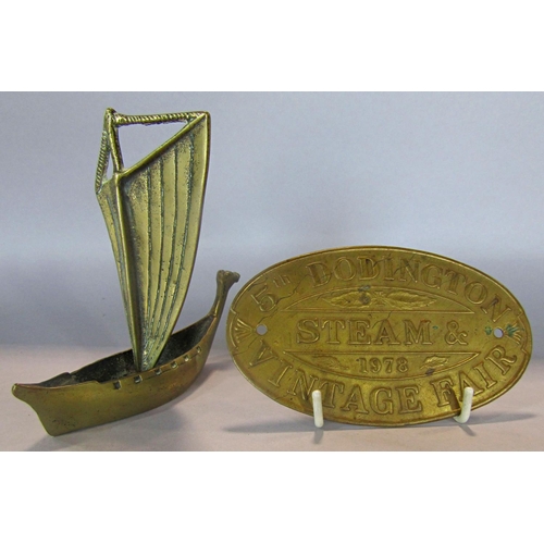 1426 - A boat’s brass propeller 39cm diam approx, a small brass plaque “Dodington Steam & Vintage Fair” and... 