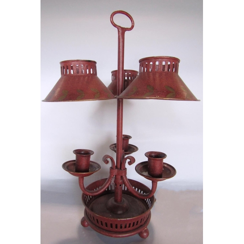 1425 - A Regency style red toleware three branch candelabra, with carrying loop handle 43.5cm tall.