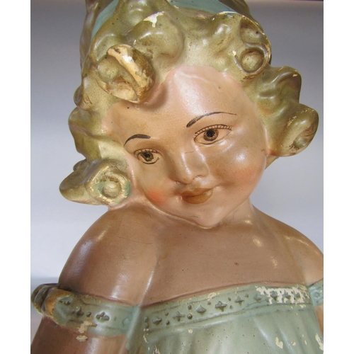 1432 - An early 20th century” Pear’s Soap” like plaster statue of a little girl in a twee pose.  60cm tall ... 