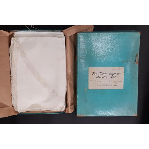 1584 - Vintage box from 'The White elephant Laundry' of Mayfair filled with laundered and starched table li... 