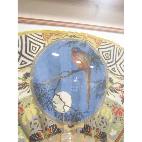 1411 - A Japanese painted silk fan with a central pheasant in moonlight, a Chinese filigree balsa fan, and ... 