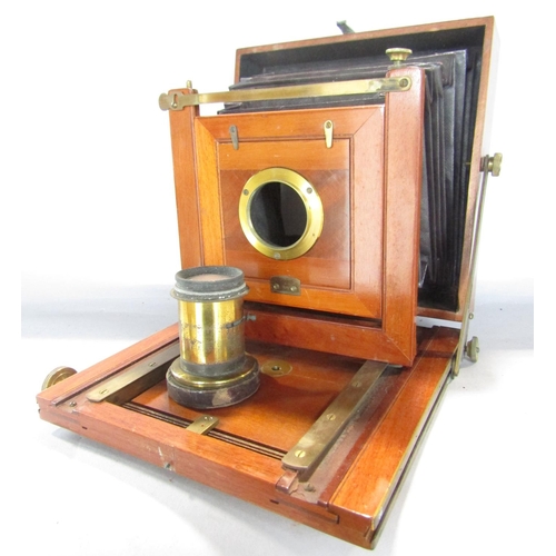 1423 - Vintage photographic equipment including a 19th century wooden folding concertina camera with a trip... 