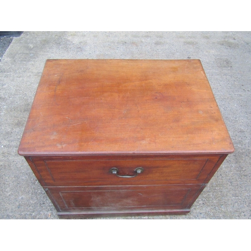 2450 - A large 19th century box commode, the rising cover revealing a generous seat within shaped arms, 80c... 