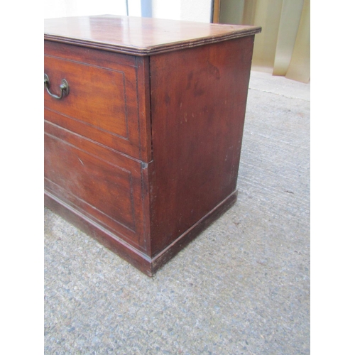 2450 - A large 19th century box commode, the rising cover revealing a generous seat within shaped arms, 80c... 