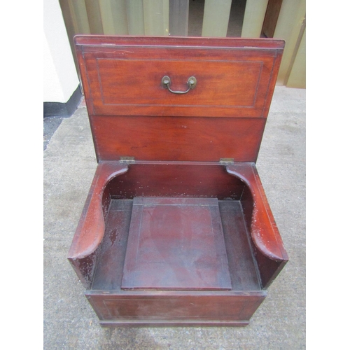 2450 - A large 19th century box commode, the rising cover revealing a generous seat within shaped arms, 80c... 