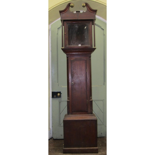 2671 - A Georgian oak longcase clock case the door cross banded in walnut, the hood with swan neck pediment